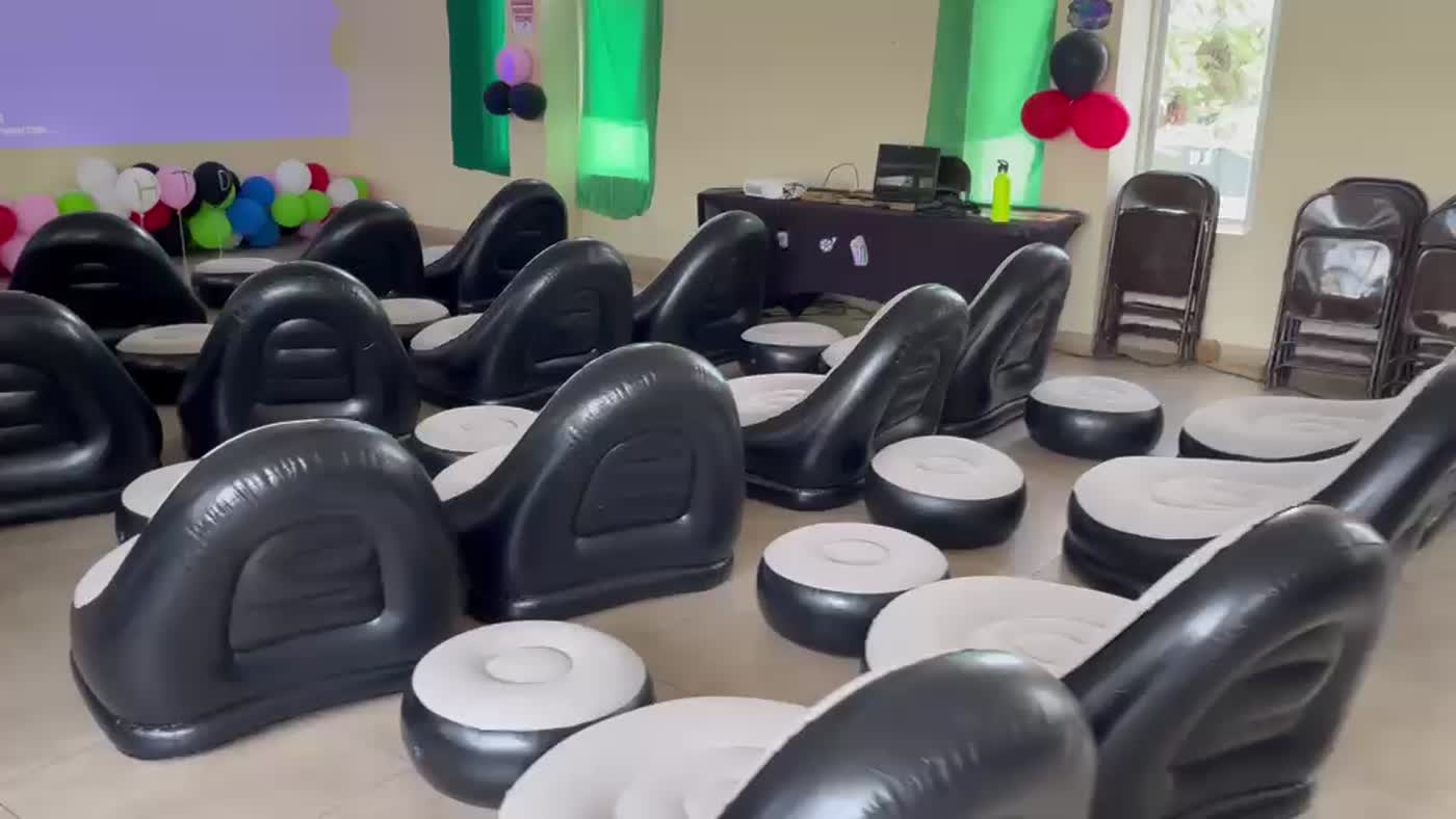 Indoor cinema setup at Providence Methodist ELI — inflatable chairs with balloons